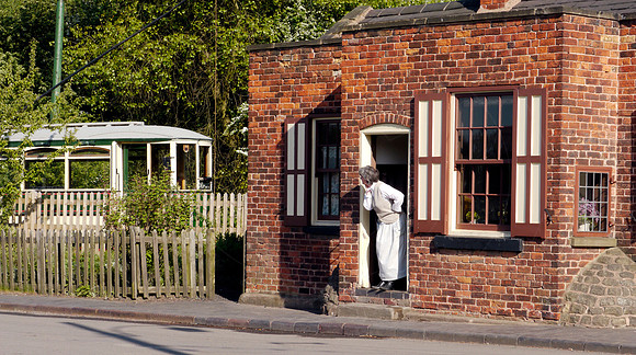 Tram passing the Toll House, at the Black Country Living Museum,