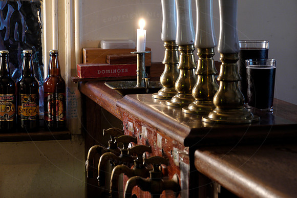 Close up of pub beer engine and bottles, at the Black Country Li